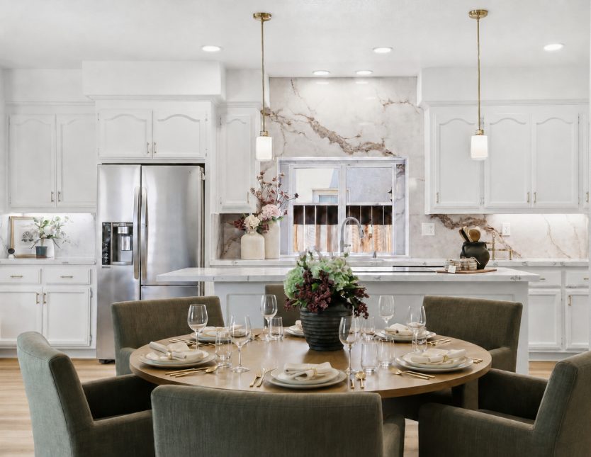 A warmly set dining table with fresh seasonal food